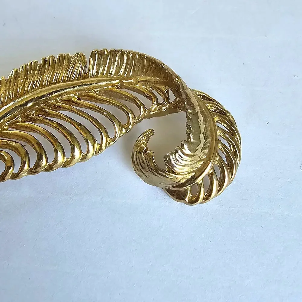 Source Unknown vintage feather